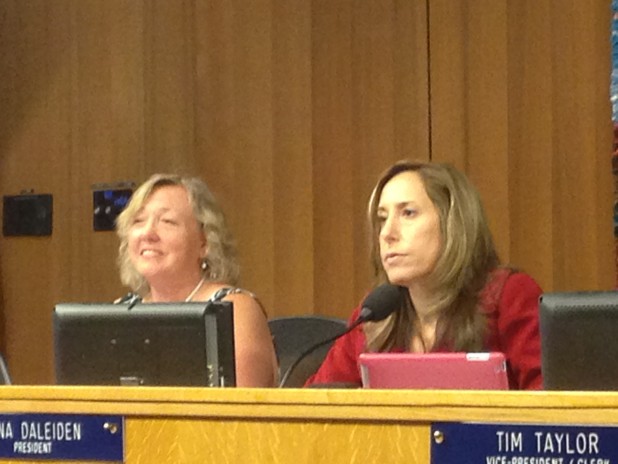 Board President Gina Daleiden (right) with Sheila Allen (left) listen to applicants talking about their credentials.