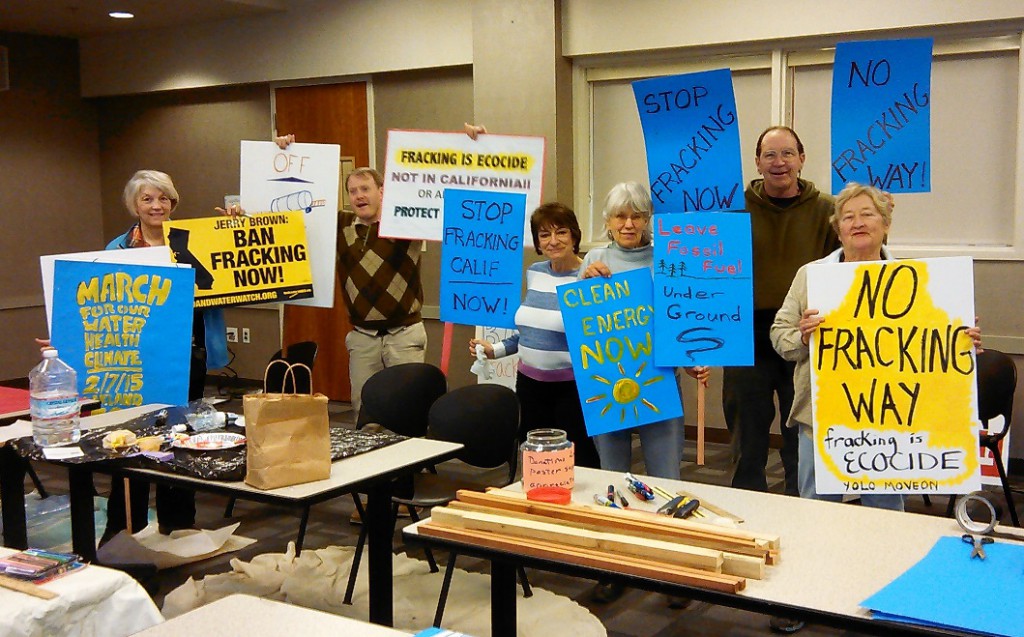 Davis activists make signs opposing fracking and crude-by-rail transport for the Climate March on Feb. 7th in Oakland.
