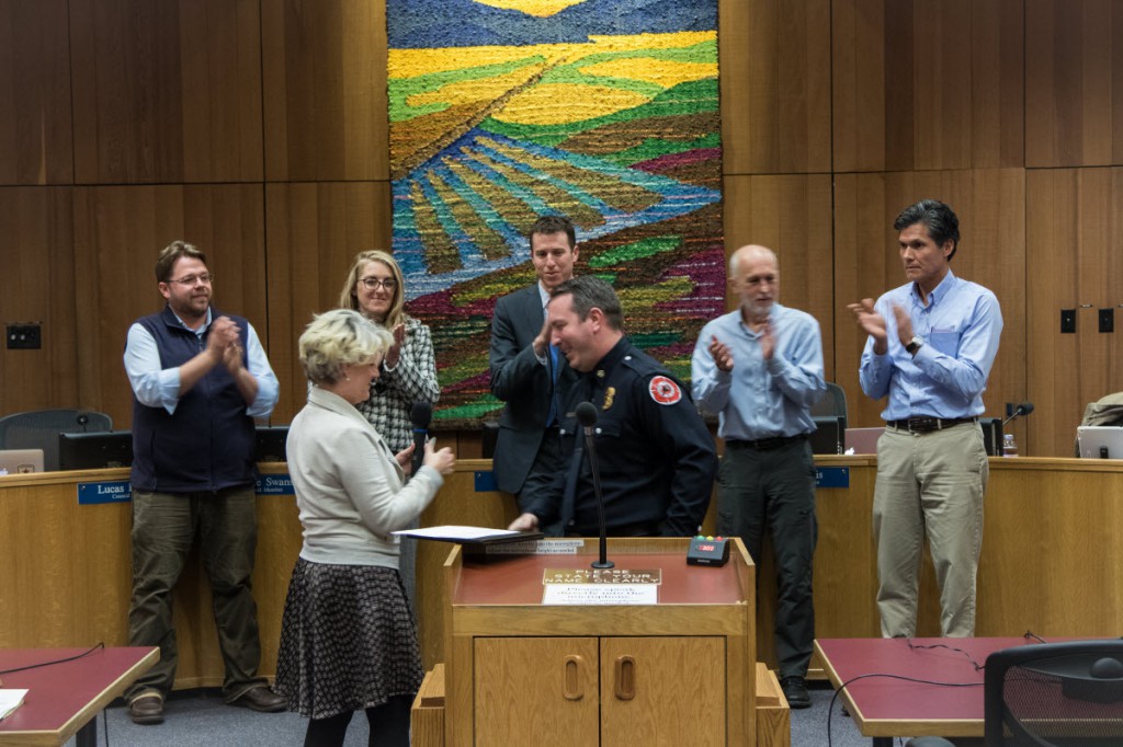 Chief Nathan Trauernicht receives the certificate from State Fire Marshal Tonya Hoover