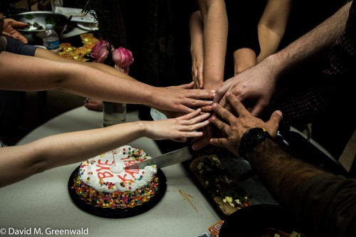 Cutting the cake becomes a moment of unity